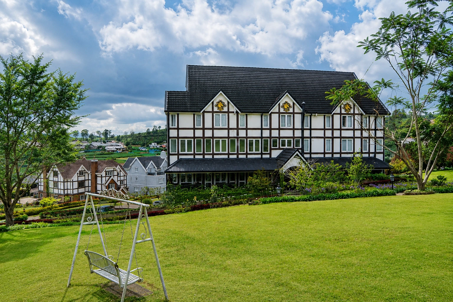 Manicured English gardens at Pedro Barn Hotel estate